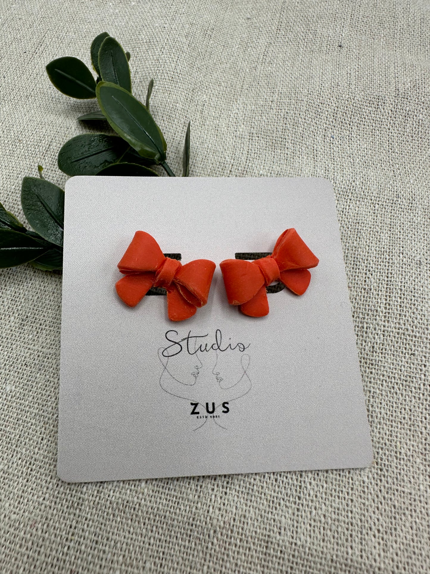 Royal Bow Warm Coral - Oranje statement oorbellen