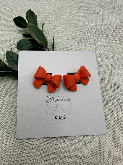 Royal Bow Warm Coral - Oranje statement oorbellen